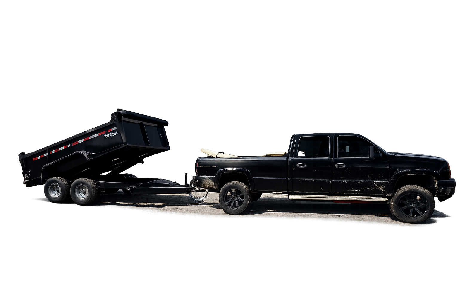 Dump trailer and work truck used by Freedom Works LLC for construction debris removal.